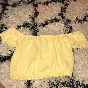 Yellow off the should frill top